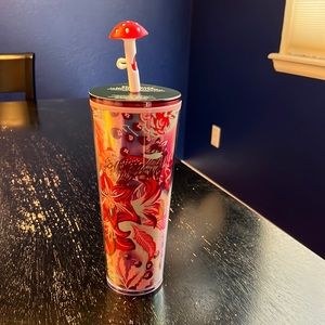 Starbucks 24 ounce travel tumbler.  Woodland theme holiday 2022